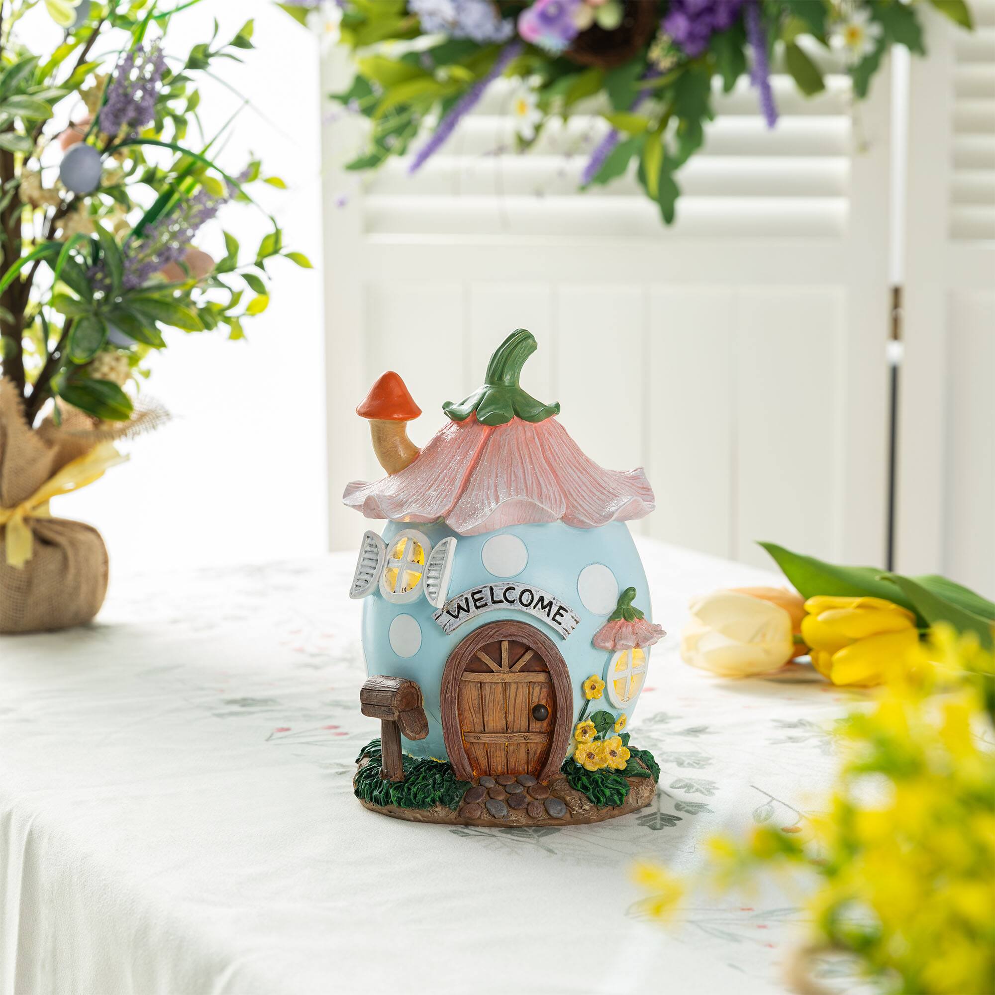Glitzhome® 8" Lighted Easter Resin Egg-Shaped House Table Decor